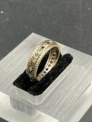 A 9ct gold ring with diamond and sapphires (Approximate Total Weight 2.5g) Size K