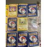 An album of vintage Pokemon cards to include golds