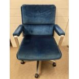 An Antocks Lairn blue and velvet Mid Century 1970's swivel chair