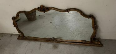 A gilt overmantel mirror (170cm x 75cm)