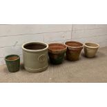 A selection of five garden pots