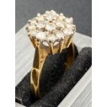 A Diamond cluster ring on an 18ct yellow gold mount