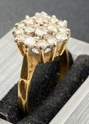 A Diamond cluster ring on an 18ct yellow gold mount