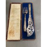 A pair of silver handled fish servers cased, makers mark JN