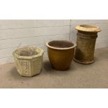 A selection of two garden pots and a chimney pot planter