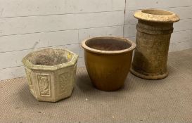 A selection of two garden pots and a chimney pot planter