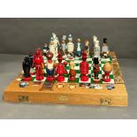 A Robin and Nell Dale handmade 'Alice Through The Looking Glass' Chess set (Slight damage to two