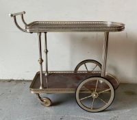 A Mid Century tea trolley with fluted column supports