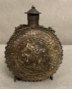 An antique brass German gunpowder flask, brass with George and the Dragon detail