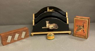 A selection of decorative items to include a lacquered letter rack boxed dominoes and two boxes