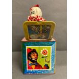 A vintage "Mettoy" clown jack in a box