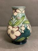 A Moorcroft vase (Approximate 14cm in height) signed to base J Moorcroft, RJB, MP and Marie