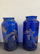 A pair of blue glass jars with an Oriental design. (H54cm)