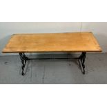 A coffee table with pine top and wrought iron frame (H45cm W107cm D40cm)