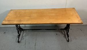 A coffee table with pine top and wrought iron frame (H45cm W107cm D40cm)