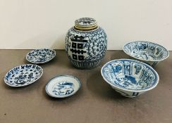 A selection of blue and white porcelain to include ginger jar, bowls and small plate