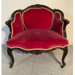 A Louis XV style armchair on cabriole legs with castors