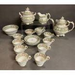 A Coalport Rococo style part tea set consisting of teapot, creamer, covered sugar bowl, slop bowl