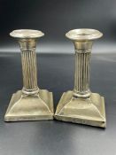 A Pair of silver column style silver candlesticks AF (Height Approx 12cm) Hallmarked for Birmingham