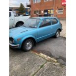 A 1975 Honda Civic in Blue Registration HGO 331N A Garage find.