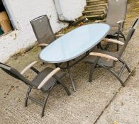 A Hartman Prestige garden table with four chairs (H81cm W180cm D102cm)