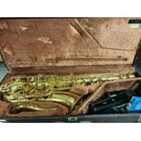 A Yamaha 32 Tenor saxophone in case with stand