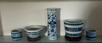 A selection of blue and white oriental China to include a beaker vase, incense burner etc