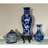 Three blue and white oriental vases and lidded pot, stamps to base