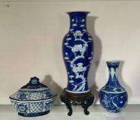Three blue and white oriental vases and lidded pot, stamps to base