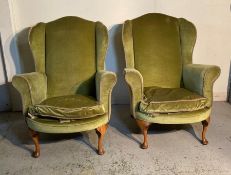 A pair of mahogany framed wing armchairs AF