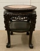 A Chinese hand carved hardwood and marble topped side table H 58cm D 45cm
