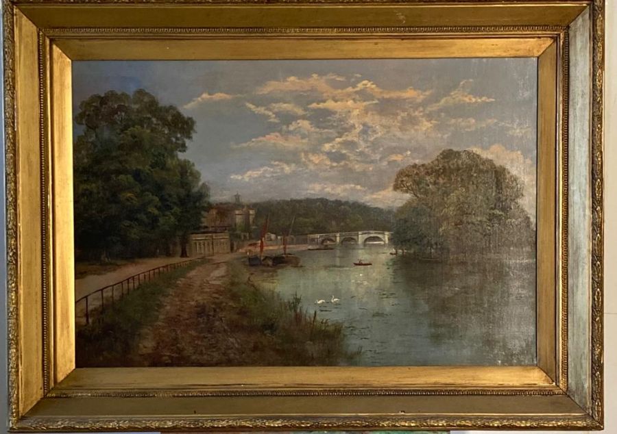 A picture of a lake view, signed lower right J. Lewis