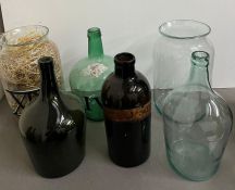 A mixed selection of display or set design glassware to include apothecary jars, balloon bottles and