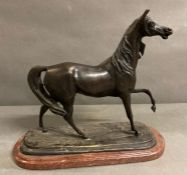 A Bronze of a Horse on a marble plinth, plinth 34 cm in length.