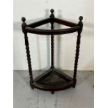 A barley twist oak corner stick stand or umbrella stand (H72cm W46cm)