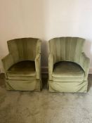 A pair of Art Deco cocktail chairs in green upholstery and dynamic line back detail.