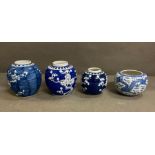 Four white and blue Chinese ginger jars
