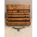 An antique oak seven drawer collectors box with hinged drop down lid (H 30 cm x 24 cm deep x width