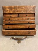 An antique oak seven drawer collectors box with hinged drop down lid (H 30 cm x 24 cm deep x width