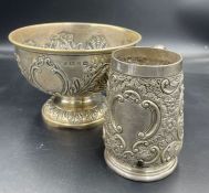 An ornate silver, engraved bowl 11cm H 15.5cm D and an engraved tankard 10.5cm H, both hallmarkd for