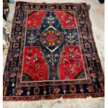 A red and blue cross wool rug/carpet (200cm x 160cm)