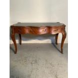 A Louis XV style French plait desk on cabriole legs (H82cm W150cm D74cm)