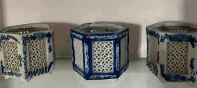 Seven blue and white hexagonal Chinese candle lanterns