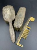 A Sterling silver dressing AF dressing table set two brushes and comb.