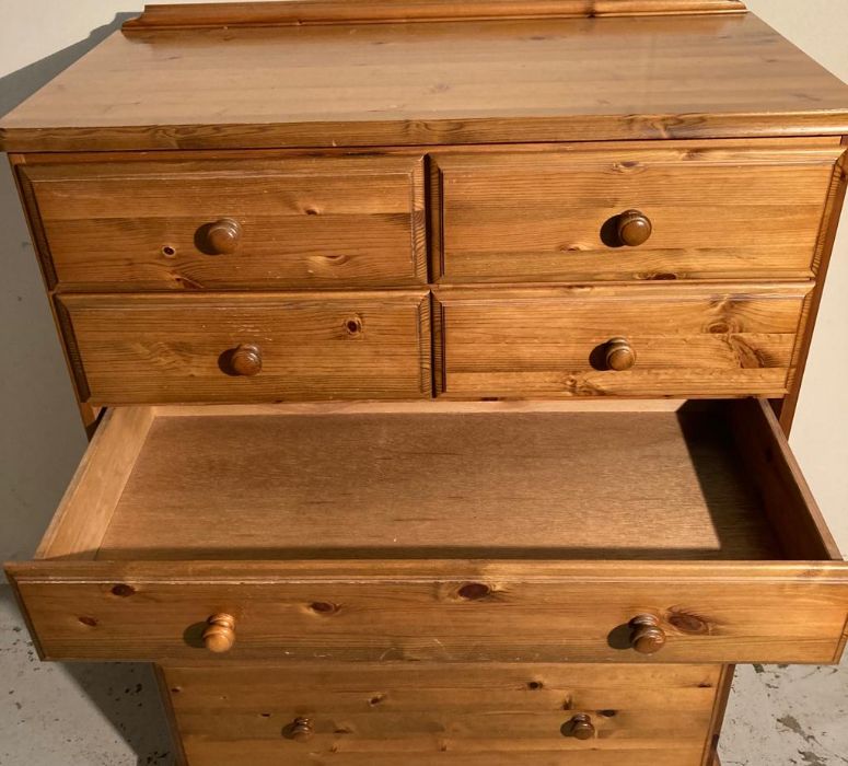 A Ducal four over three pine chest of drawers (H115cm W86cm D46cm) - Image 3 of 4