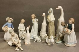 A selection of porcelain figurines to include Nao etc