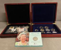 Two boxes of various coins to include 1935 and 1937 Crowns, various collectable crowns and photo