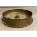 An artillery shell brass ash tray