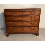 A Georgian mahogany chest of four graduated drawers of small proportion on bracket feet with a