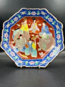 A 19th Century octagonal fluted bowl depicting the immortals.